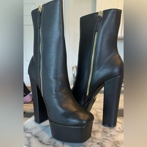 Black leather platform high heel boots